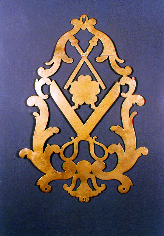 Český Krumlov area, brass shield from door of tailor's workshop, collection of Regional Museum of National History in Český Krumlov