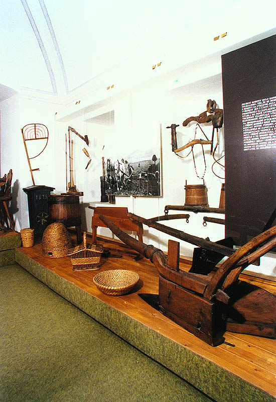 View of ethnography exposition with agricultural equipment of Regional Museum of National History in Český Krumlov