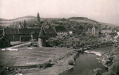 View onto the brewery and brewery gardens in Český Krumlov from Havranní cliffs, historical photo View onto the brewery and brewery gardens in Český Krumlov from Havranní cliffs, historical photo