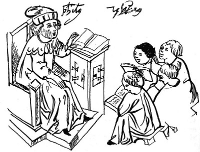 The period school snap. The pupils are learning from the borrowed books, the teacher is sitting at the teacher´s desk, source: Toulky českou minulostí II, Petr Hora, 1991, ISBN - 80 - 208 - 0111 - 1 